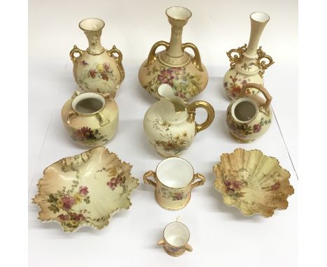 A good collection of Royal Worcester floral painted blush ivory porcelain including vases and a jug.