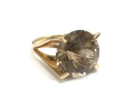 A modernist 14ct gold ring set with a large citrine. Ring size N/M, total weight approximately 6.5 grams.