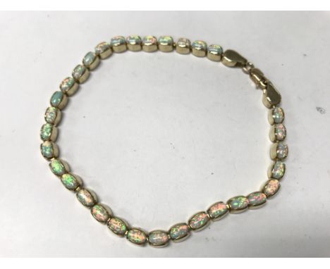 A 14ct gold opal bracelet a/f. Weight approx 16g