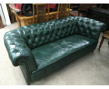 A Vintage Green leather Chesterfield Sofa, button down back