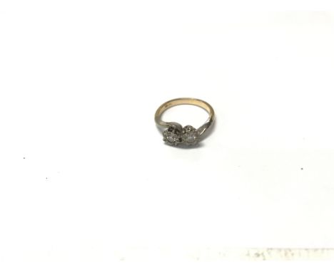 An 18ct gold cross over ring. Size approx P, weight approx 5g