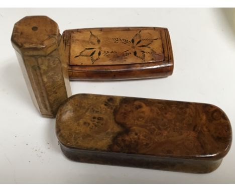 Two walnut 19th Century snuff boxes and one other small treen box (3)