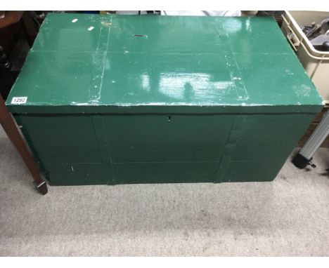 A painted green pine trunk with metal bound top. Approx 53x93x45cm