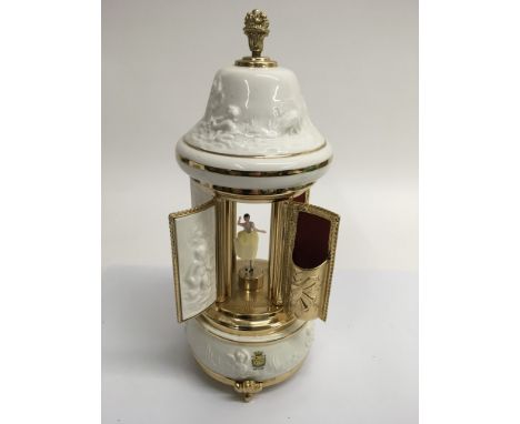 A Capodimonte ceramic musical cigarette dispenser enclosing a ballerina, approx 31cm