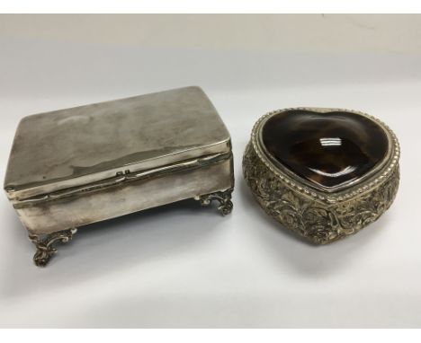 A silver and tortershell heart shaped trinket box and one other rectangular silver box (2)