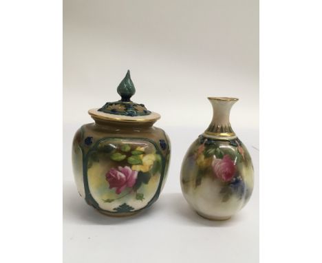 A Royal Worcester covered pot painted with roses and a conforming Hadley vase.Approx 11and 13cm respectively.