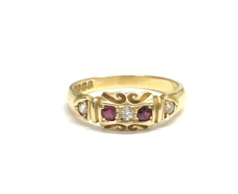 An 18ct gold Victorian alternating diamond and ruby ring. Ring size approx N/M, total weight approximately 3.4 grams.