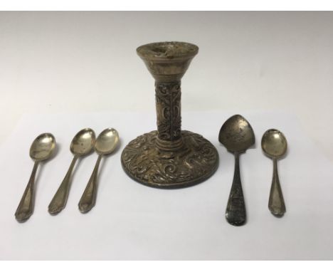 A silver candle stick and silver spoons together with plated ware various
