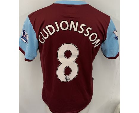 Burnley 2009 - 2010 Match Worn Football Shirt: Claret and blue short sleeve shirt. Number 8 Gudjonsson. Premier League badgin