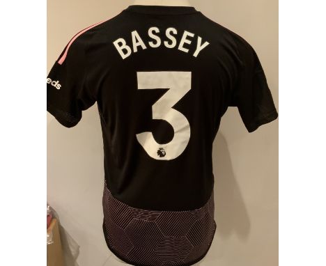 Fulham 2023 - 2024 Match Worn Football Shirt: Black and pink short sleeve shirt with Premier League badges to sleeves. Bassey