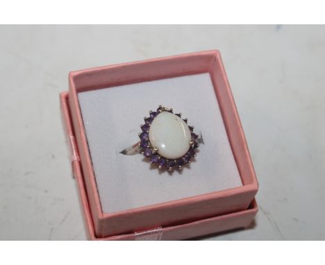 A large Sterling silver opal and amethyst set dress ring, ring size M/N. approx. 4.3gms 