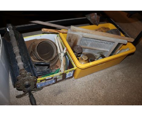 Two boxes of various vintage items including washboard, mangle, flat irons, sieves, wash dolly, stoneware bottles, rug beater
