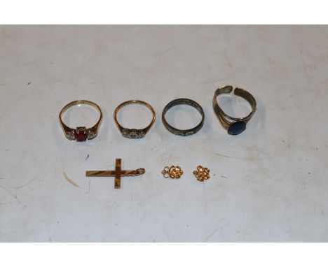 A 9ct gold dress ring set with chip diamonds, ring size O; and a 9ct gold dress ring set with red and white stones, size Q/R;