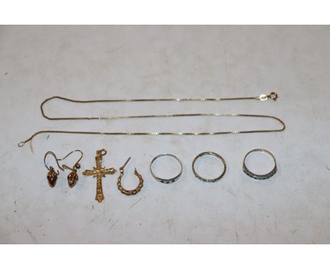 A box containing yellow metal cross pendant; a 9ct gold chain; a 9ct gold ear-ring; a pair of yellow metal ear-rings in the f
