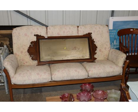 An Ercol three seater settee