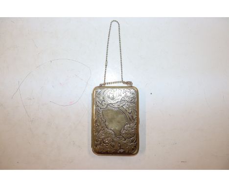 A sovereign case compact with blank cartouche and thistle decoration&nbsp;