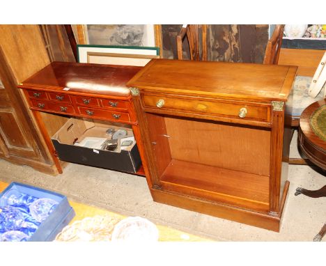 A reproduction hall table, supports united by undertray and a reproduction bookcase with adjustable shelf and fitted single d