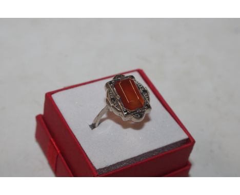 An Edwardian silver carnelian and marcasite set ring, rings size N/O