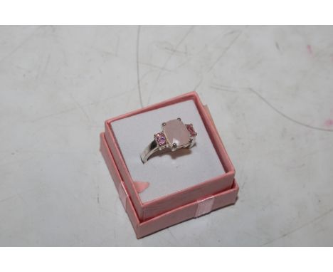 A Sterling silver pink sapphire and rose quartz set ring, ring size N/O