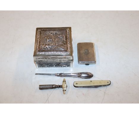 An Eastern white metal trinket box decorated with hunting scenes and animals, 160gms; a silver engine turned decorated vesta 