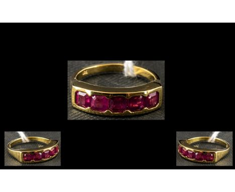 Asscher Cut Ruby Band Ring, a row of five rubies of excellent colour, with the rare Asscher cut, closely set across the finge