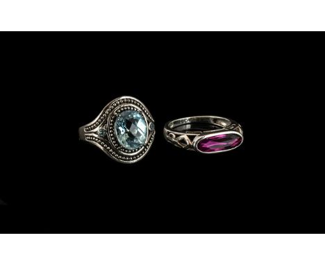 Two Sterling Silver Rings - Swiss Topaz, London Blue Colour Size Q, and pink oval stone silver ring.