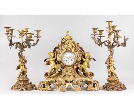 A GOOD LOUIS XVI ORMOLU THREE PIECE CLOCK GARNITURE, the clock by TILFACQ DURDAN A. LILLE with circular dial, blue and white 