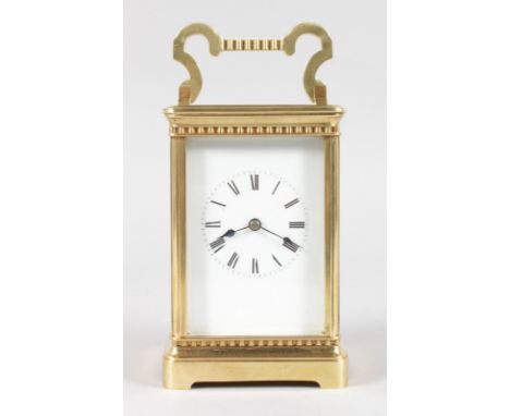 A GOOD 19TH CENTURY FRENCH BRASS CARRIAGE CLOCK striking on a gong. 5.75ins high.