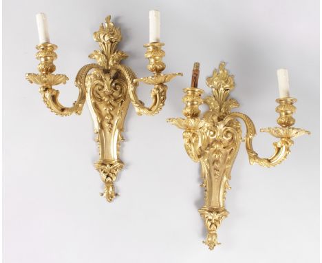 A SUPERB PAIR OF LOUIS XVI ORMOLU TWO LIGHT WALL SCONCES, with acanthus scrolls, the branches converted to electricity. 21ins