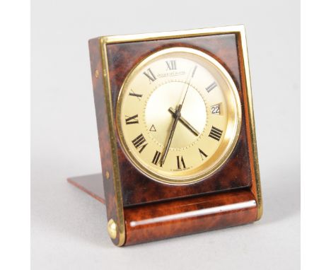 A JAEGER-LECOULTRE TORTOISESHELL FOLDING TABLE WATCH, No. 1191993, in a leather case.
