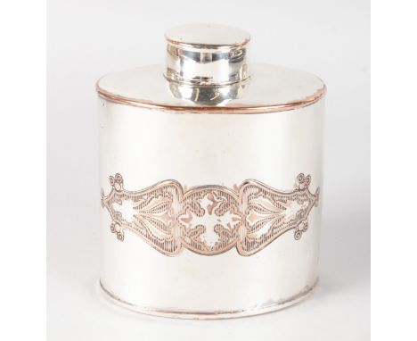 AN ART DECO PLATE OVAL TEA CADDY AND COVER.