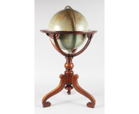 A GOOD 12-INCH GLOBE AND STAND by W. & A. K. JOHNSTON, GEOGRAPHER, Engraver and Printer to the Queen. 30ins high overall.