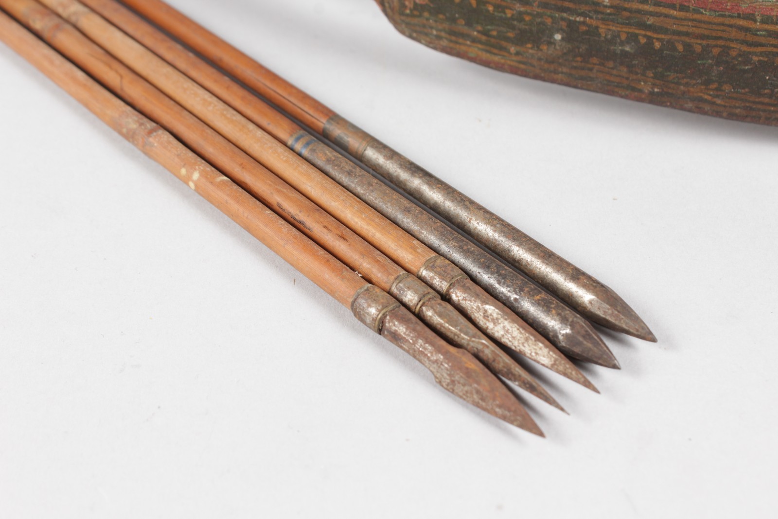 AN ISLAMIC BOW AND FIVE ARROWS.
