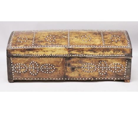 AN EARLY VELLUM COVERED AND METAL STUDDED DOME TOP TRUNK. 3ft 2ins long x 1ft 6ins deep x 1ft 2ins high.