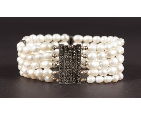 A FIVE ROW PEARL AND MARCASITE BRACELET.