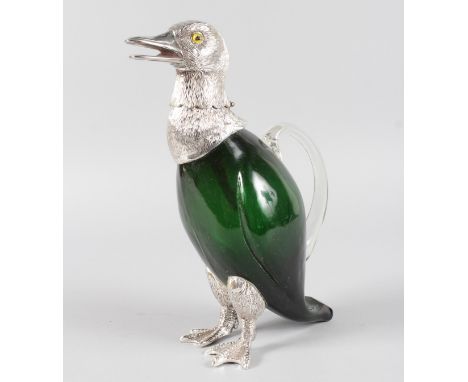 A GOOD RUBY GLASS DUCK CLARET JUG with plated head and feet. 10.5ins high.