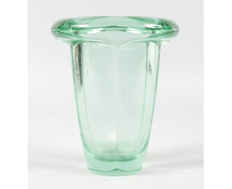 A HEAVY ART DECO GLASS VASE. 7ins high.