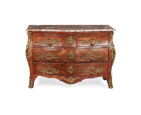 A LOUIS XV KINGWOOD, TULIP AND ORMOLU MOUNTED BOMBE COMMODE by LEONARD BOUDIN, CIRCA. 1750, the shaped pink veined marble top