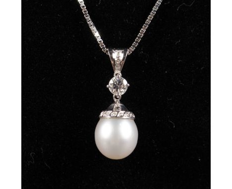 AN 18CT WHITE GOLD MOUNTED, PEARL AND DIAMOND PENDANT AND CHAIN.