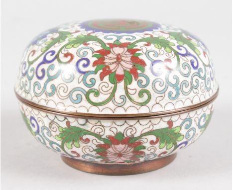 A JAPANESE CIRCULAR CLOISONNE ENAMEL CIRCULAR BOX AND COVER. 4ins diameter.