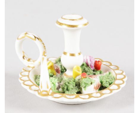 AN EARLY 19TH CENTURY RARE MINIATURE TAPERSTICK encrusted with shells, probably Chamberlains. 1.75ins tall.
