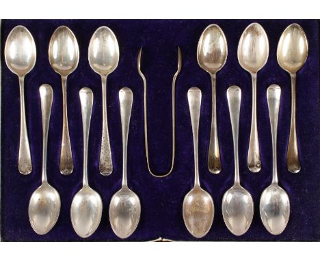 A CASED SET OF TWELVE RAT TAIL TEASPOONS AND SUGAR TONGS. Sheffield 1925.  Makers: J. R. & S.