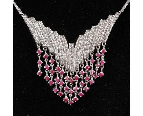 A SILVER ART DECO DESIGN RUBY AND BRILLIANT SET NECKLACE.