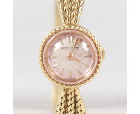 A LADIES JAEGER-LECOULTRE 18CT YELLOW GOLD WATCH.