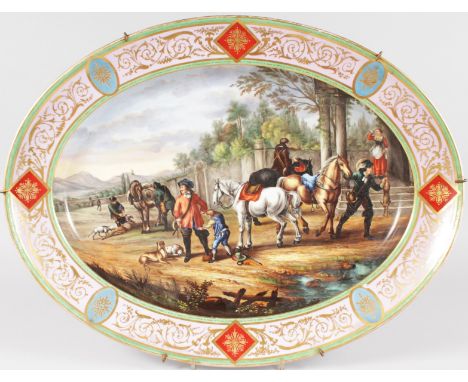 A SUPERB LARGE VIENNA OVAL DISH, with light blue and gilt border, the centre painted with men and horses resting after the hu