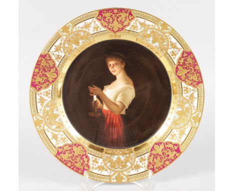 A SUPERB VIENNA PORTRAIT PLATE with rich gold border, the centre painted "GUTE NACHT" a young girl with a candle. Mark in blu