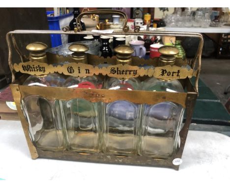 A SET OF FOUR VINTAGE GLASS SPIRIT BOTTLES AND CASE 