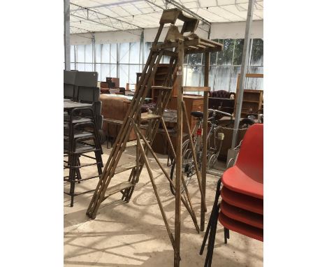 A VINTAGE FIVE STEP LADDER (A/F - DAMAGE TO ONE WOODEN BRACING) 