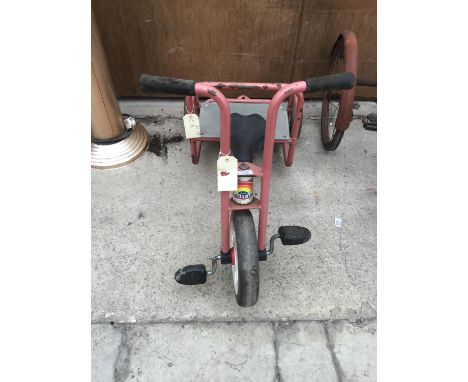 A VINTAGE 'TALTRIKE' CHILDS TRICYCLE WITH ATTACHED REAR SEAT 