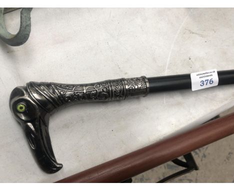 AN EAGLE HANDLED WALKING STICK 